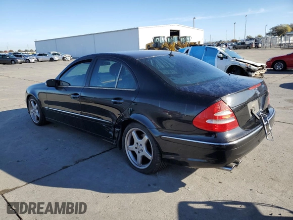 2004 Mercedes-Benz E-Class 5.0L with VIN WDBUF70J64A585084, listed as a Copart auction lot 80297124 with 233,638 mi miles and Salvage Title. Bid and sale history available at carsss.com. Image 2.