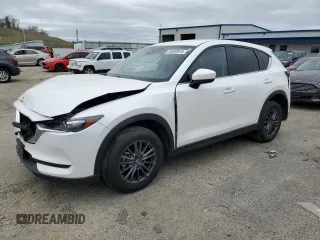 2020 Mazda CX-5 Touring z VIN JM3KFBCM8L1789067, wystawiony jako Copart lot #54953015 z przebiegiem 134 306 mil mil oraz Nie do naprawy. Historia ofert i sprzedaży dostępna na DreamBid. Obrazek 1.
