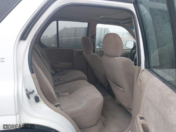 2001 Isuzu Rodeo S with VIN 4S2DM58WX14315138, listed as a IAAI auction lot 41535619 with 217,960 mi miles. Bid and sale history available at carsss.com. Image 8.