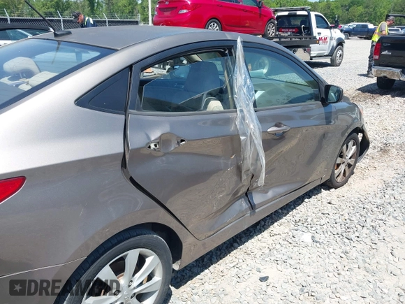 2014 Hyundai Accent GLS with VIN KMHCU4AE7EU736691, listed as a IAAI auction lot 42054514 with 80,715 mi miles and . Bid and sale history available at carsss.com. Image 12.
