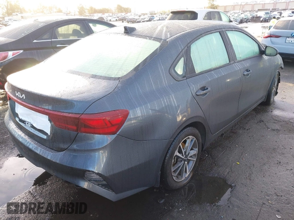 2023 Kia Forte LXS with VIN 3KPF24AD7PE536653, listed as a IAAI auction lot 41562883 with 32,700 mi miles and . Bid and sale history available at DreamBid. Image 4.