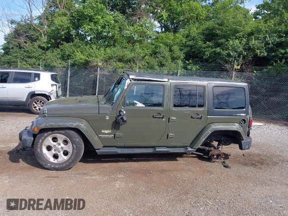 2015 Jeep Wrangler Unlimited Altitude z VIN 1C4HJWEG0FL752152, wystawiony jako IAAI lot #42311043 z przebiegiem 112 379 mil mil oraz . Historia ofert i sprzedaży dostępna na DreamBid. Obrazek 14.