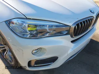2017 BMW X6 xDrive35i z VIN 5UXKU2C3XH0U29395, wystawiony jako IAAI lot #41237496 z przebiegiem 82 836 mil mil oraz . Historia ofert i sprzedaży dostępna na DreamBid. Obrazek 6.
