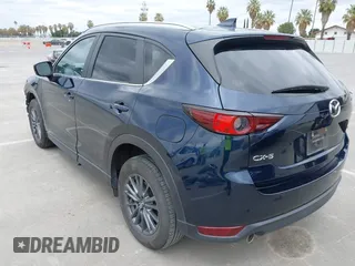 2020 Mazda CX-5 Touring with VIN JM3KFACM2L0856777, listed as a IAAI auction lot 42073972 with 151,628 mi miles. Bid and sale history available at carsss.com. Image 3.