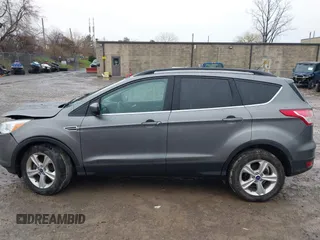 2014 Ford Escape SE with VIN 1FMCU9GX3EUB91417, listed as a IAAI auction lot 42009257 with 87,164 mi miles and . Bid and sale history available at DreamBid. Image 14.