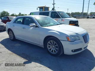 2014 Chrysler 300 with VIN 2C3CCAET6EH173381, listed as a IAAI auction lot 42158270 with 124,551 mi miles. Bid and sale history available at carsss.com. Image 1.