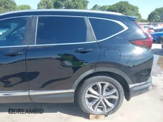 2020 Honda CR-V Touring z VIN 7FART6H91LE005707, wystawiony jako IAAI lot #42326337 z przebiegiem 40 555 mil mil oraz . Historia ofert i sprzedaży dostępna na DreamBid. Obrazek 20.