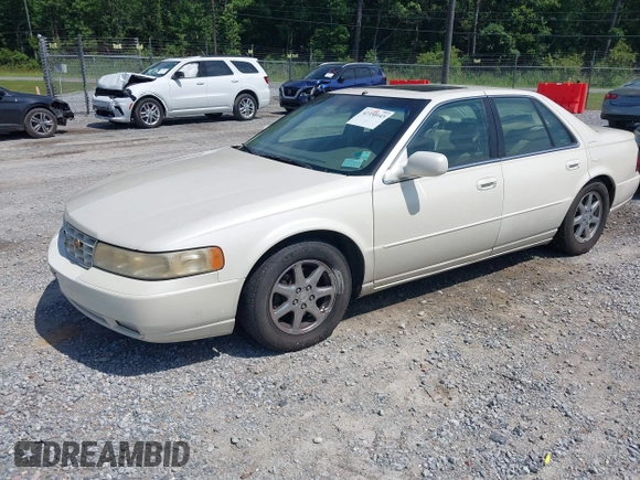 2000 Cadillac Seville Touring STS z VIN 1G6KY5495YU145937, wystawiony jako IAAI lot #42330143 z przebiegiem 217 894 mil mil oraz . Historia ofert i sprzedaży dostępna na DreamBid. Obrazek 2.