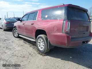2019 GMC Yukon XL SLT with VIN 1GKS2GKC9KR341807, listed as a IAAI auction lot 41658848 with 68,204 mi miles. Bid and sale history available at carsss.com. Image 3.