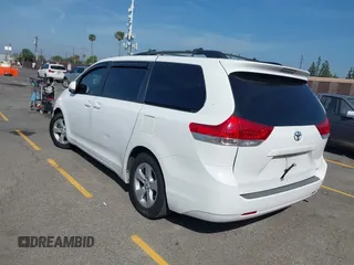 2011 Toyota Sienna LE AAS with VIN 5TDKK3DC1BS040029, listed as a IAAI auction lot 42087897 with 132,843 mi miles. Bid and sale history available at carsss.com. Image 3.