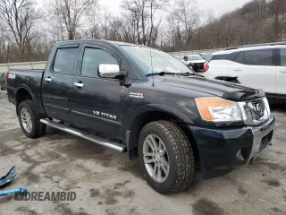 2015 Nissan Titan Pro-4X with VIN 1N6AA0EC2FN501632, listed as a Copart auction lot 84063524 with 92,342 mi miles and Salvage title. Bid and sale history available at DreamBid. Image 4.