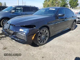 2020 BMW 5 Series 530e with VIN WBAJA9C00LCD60874, listed as a Copart auction lot 87960825 with 91,036 mi miles and Salvage Title. Bid and sale history available at carsss.com. Image 1.
