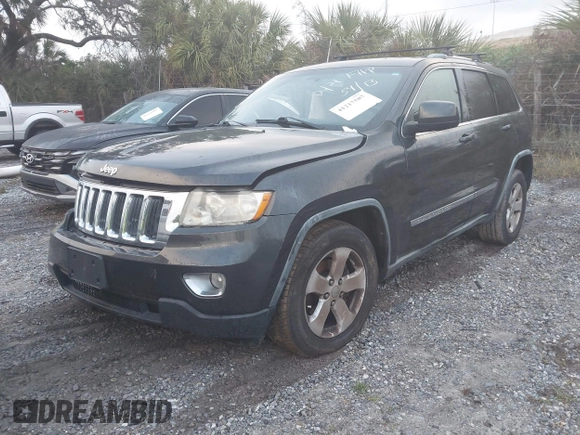 2011 Jeep Grand Cherokee Laredo z VIN 1J4RR4GG2BC737140, wystawiony jako IAAI lot #41217587 z przebiegiem Nie podano mil oraz . Historia ofert i sprzedaży dostępna na DreamBid. Obrazek 22.