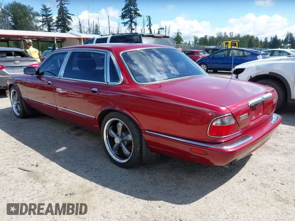 1998 Jaguar XJ Vanden Plas with VIN SAJKX6249WC844067, listed as a IAAI auction lot 42145235 with 117,142 mi miles and . Bid and sale history available at DreamBid. Image 3.