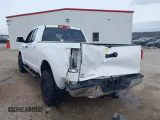 2013 Toyota Tundra z VIN 5TFRM5F19DX064236, wystawiony jako IAAI lot #41701170 z przebiegiem 147 312 mil mil oraz . Historia ofert i sprzedaży dostępna na DreamBid. Obrazek 3.