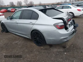 2018 BMW 3 Series 330i xDrive with VIN WBA8D9C55JA607605, listed as a IAAI auction lot 41682994 with 79,285 mi miles and . Bid and sale history available at DreamBid. Image 3.