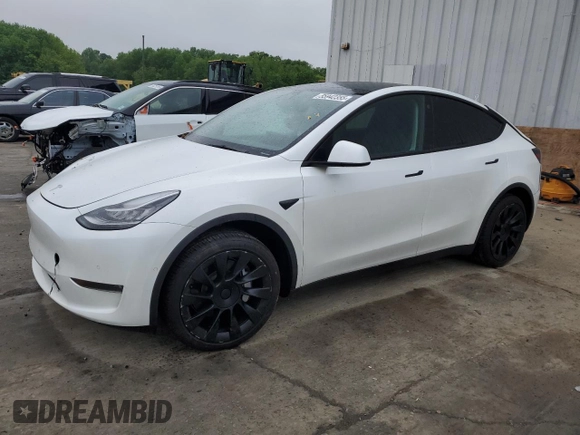 2022 Tesla Model Y Long Range z VIN 7SAYGDEE5NA016276, wystawiony jako Copart lot #55942355 z przebiegiem 14 085 mil mil oraz Szkody całkowita. Historia ofert i sprzedaży dostępna na DreamBid. Obrazek 1.