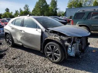 2019 Lexus UX 250h with VIN JTHU9JBH0K2002451, listed as a Copart auction lot 56042605 with 69,605 mi miles and Salvage title. Bid and sale history available at DreamBid. Image 4.