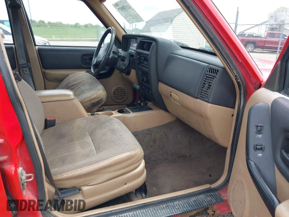 1999 Jeep Cherokee Sport with VIN 1J4FT68S6XL511158, listed as a IAAI auction lot 42170917 with 251,442 mi miles and . Bid and sale history available at DreamBid. Image 5.