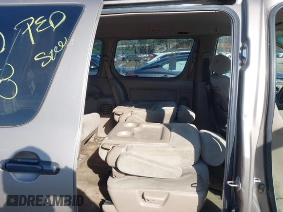 1999 Toyota Sienna LE with VIN 4T3ZF13CXXU121819, listed as a IAAI auction lot 41607624 with 999,999 mi miles. Bid and sale history available at carsss.com. Image 8.