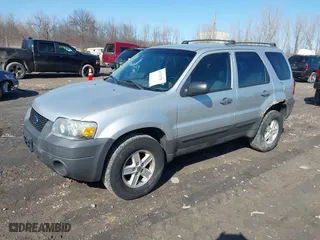 2007 Ford Escape XLS with VIN 1FMYU92Z87KA05657, listed as a IAAI auction lot 41723701 with 152,713 mi miles. Bid and sale history available at carsss.com. Image 2.