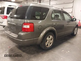 2006 Ford Freestyle Limited with VIN 1FMDK06186GA34761, listed as a IAAI auction lot 40359943 with 127,959 mi miles. Bid and sale history available at carsss.com. Image 4.