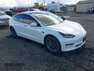 2023 Tesla Model 3 z VIN 5YJ3E1EA7PF570871, wystawiony jako IAAI lot #41772803 z przebiegiem Nie podano mil oraz . Historia ofert i sprzedaży dostępna na DreamBid. Obrazek 1.