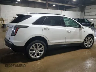2021 Cadillac XT5 AWD Sport with VIN 1GYKNGRS5MZ142444, listed as a Copart auction lot 54502285 with 27,070 mi miles and Salvage title. Bid and sale history available at DreamBid. Image 3.