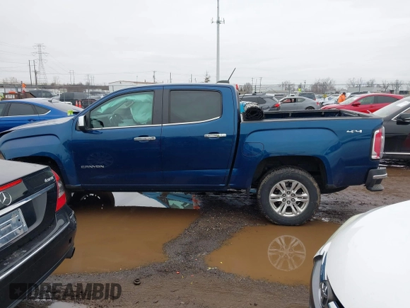 2019 GMC Canyon 4WD SLE with VIN 1GTG6CEN2K1209224, listed as a IAAI auction lot 41554534 with 65,510 mi miles. Bid and sale history available at carsss.com. Image 14.