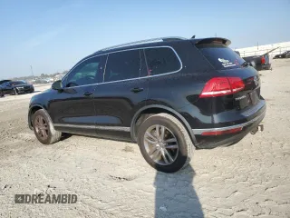 2016 Volkswagen Touareg Sport with VIN WVGEF9BP7GD010767, listed as a Copart auction lot 44782585 with 125,970 mi miles and Salvage Title. Bid and sale history available at DreamBid. Image 2.