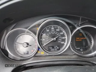 2014 Mazda CX-5 Grand Touring with VIN JM3KE4DY2E0354795, listed as a Copart auction lot 70713544 with 58,848 mi miles and Salvage Title. Bid and sale history available at DreamBid. Image 9.