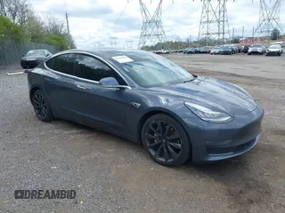 2020 Tesla Model 3 Long Range with VIN 5YJ3E1EB2LF646449, listed as a IAAI auction lot 42059086 with 120,981 mi miles and . Bid and sale history available at DreamBid. Image 1.