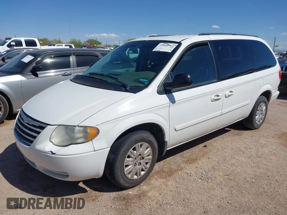 2005 Chrysler Town & Country LX with VIN 2C4GP44R75R213048, listed as a IAAI auction lot 42068985 with 100,688 mi miles and . Bid and sale history available at DreamBid. Image 2.