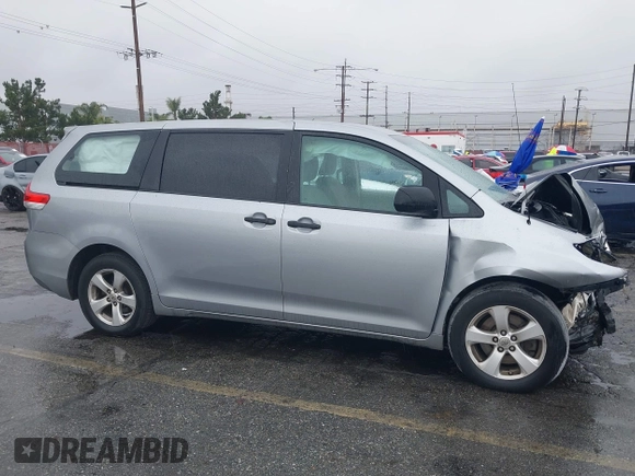 2012 Toyota Sienna z VIN 5TDZK3DC6CS263912, wystawiony jako IAAI lot #42174360 z przebiegiem 95 216 mil mil oraz . Historia ofert i sprzedaży dostępna na DreamBid. Obrazek 14.