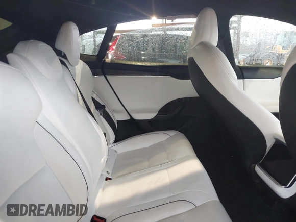 2022 Tesla Model S Plaid with VIN 5YJSA1E64NF477855, listed as a IAAI auction lot 41470591 with Not provided miles and . Bid and sale history available at DreamBid. Image 8.