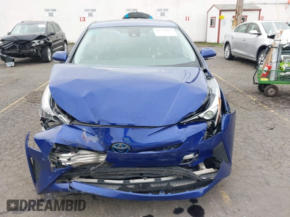 2018 Toyota Prius Two with VIN JTDKBRFU8J3067821, listed as a IAAI auction lot 41767013 with 82,285 mi miles and . Bid and sale history available at carsss.com. Image 6.