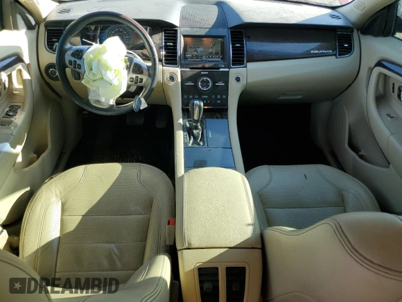 2015 Ford Taurus Limited with VIN 1FAHP2F81FG129569, listed as a Copart auction lot 60841965 with 122,077 mi miles and Clean title. Bid and sale history available at DreamBid. Image 8.