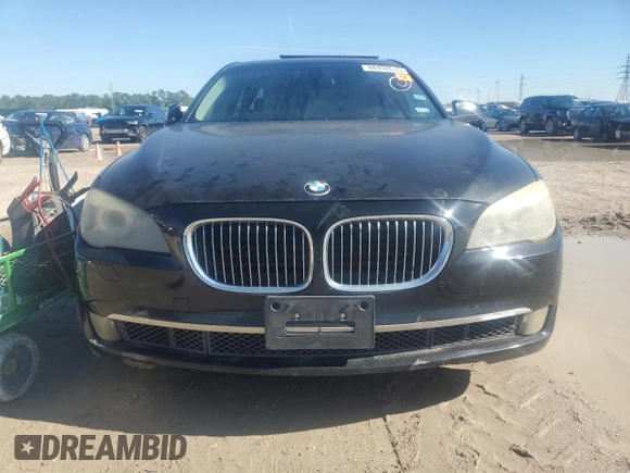 2012 BMW 7 Series 740i with VIN WBAKA4C52CDS99036, listed as a Copart auction lot 88492615 with Not provided miles and Salvage title. Bid and sale history available at DreamBid. Image 5.