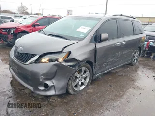 2014 Toyota Sienna SE with VIN 5TDXK3DC4ES434604, listed as a IAAI auction lot 41346434 with 108,633 mi miles and . Bid and sale history available at DreamBid. Image 2.