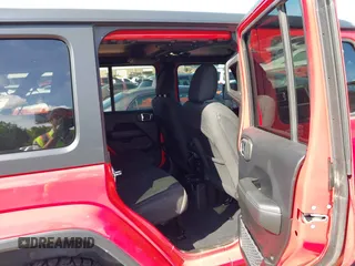 2019 Jeep Wrangler Unlimited Sahara with VIN 1C4HJXEG7KW551864, listed as a IAAI auction lot 42170875 with 115,695 mi miles and . Bid and sale history available at DreamBid. Image 8.
