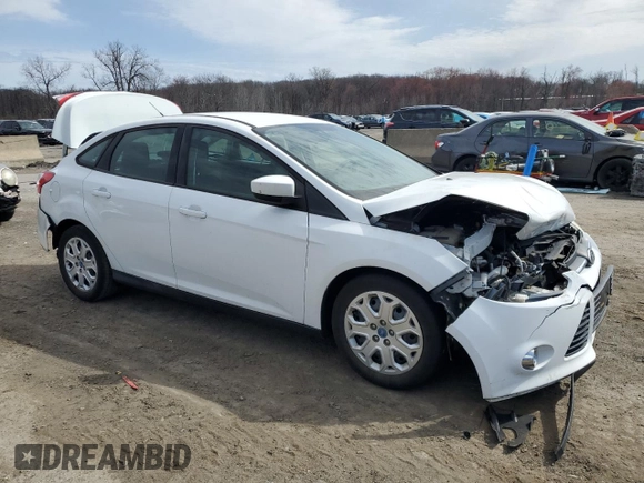 2012 Ford Focus SE with VIN 1FAHP3F25CL213172, listed as a Copart auction lot 51518755 with 67,520 mi miles and Salvage Title. Bid and sale history available at carsss.com. Image 4.