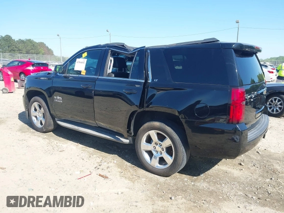 2015 Chevrolet Tahoe LT with VIN 1GNSCBKC8FR268891, listed as a IAAI auction lot 41964602 with 175,035 mi miles and . Bid and sale history available at DreamBid. Image 3.