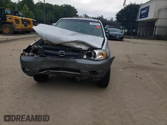 2001 Mazda Tribute LX with VIN 4F2CU08141KM65160, listed as a Copart auction lot 60895624 with 255,194 mi miles and Salvage Title. Bid and sale history available at DreamBid. Image 12.