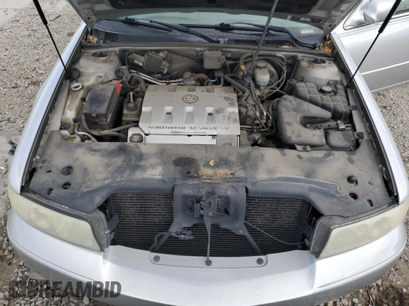 2003 Cadillac Seville Luxury SLS z VIN 1G6KS54Y53U262581, wystawiony jako Copart lot #55597595 z przebiegiem 80 832 mil mil oraz Szkoda całkowita • Salvage title. Historia ofert i sprzedaży dostępna na DreamBid. Obrazek 11.