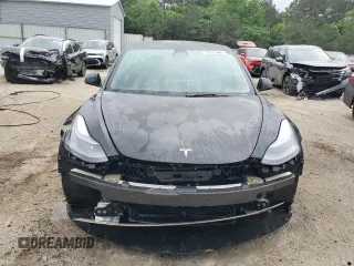 2022 Tesla Model 3 with VIN 5YJ3E1EA0NF372095, listed as a Copart auction lot 54958215 with 148,441 mi miles and Clean Title. Bid and sale history available at DreamBid. Image 5.