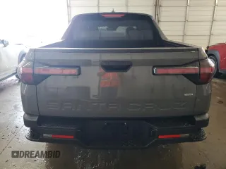 2024 Hyundai Santa Cruz SEL z VIN 5NTJBDDE8RH117547, wystawiony jako Copart lot #62145825 z przebiegiem 10 835 mil mil oraz Szkoda całkowita • Salvage title. Historia ofert i sprzedaży dostępna na DreamBid. Obrazek 6.