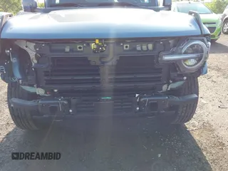 2024 Ford Bronco Outer Banks z VIN 1FMDE8BH3RLB41205, wystawiony jako IAAI lot #42558633 z przebiegiem 1 457 mil mil oraz . Historia ofert i sprzedaży dostępna na DreamBid. Obrazek 18.