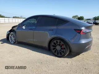 2022 Tesla Model Y Performance with VIN 7SAYGDEFXNF521502, listed as a Copart auction lot 56132745 with 73,339 mi miles and Salvage title. Bid and sale history available at DreamBid. Image 2.