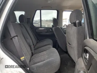 2006 GMC Envoy SLE z VIN 1GKDT13S562124794, wystawiony jako Copart lot #51649085 z przebiegiem 152 844 mil mil oraz Szkoda całkowita • Salvage title. Historia ofert i sprzedaży dostępna na DreamBid. Obrazek 12.