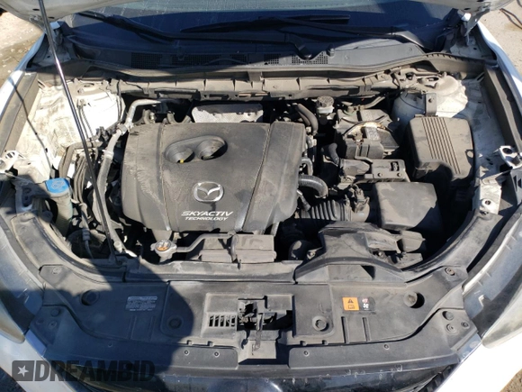2014 Mazda CX-5 Grand Touring with VIN JM3KE4DY6E0376413, listed as a Copart auction lot 53204935 with 126,791 mi miles and Salvage Title. Bid and sale history available at DreamBid. Image 12.